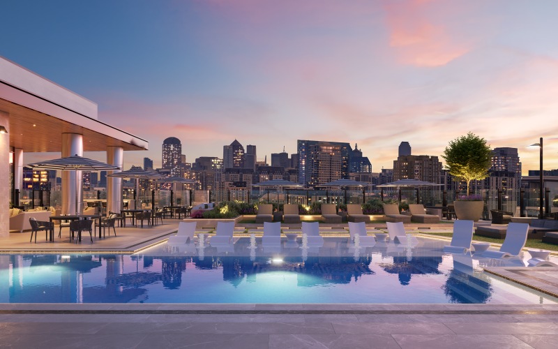 A pool overlooking the city skyline