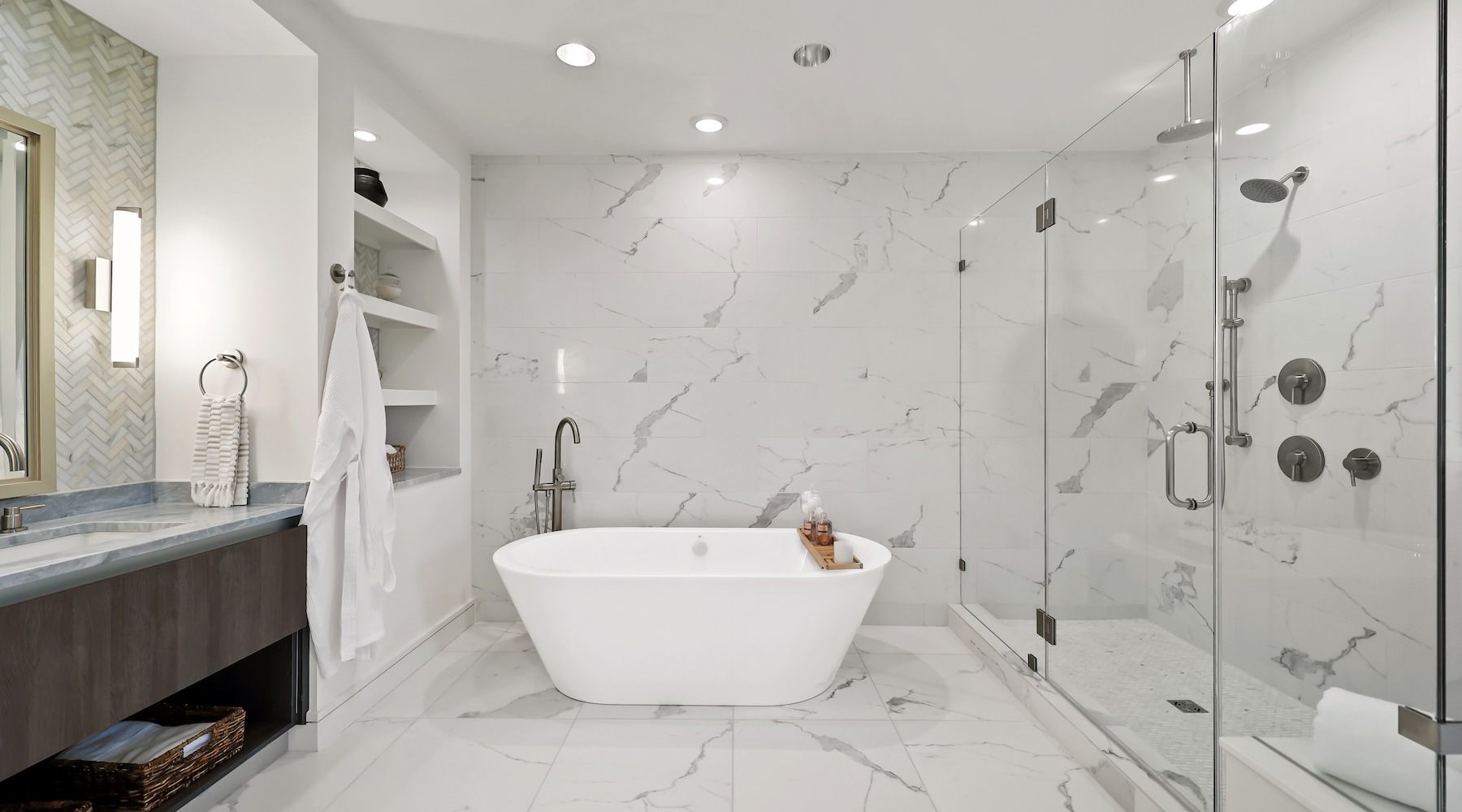 a bathroom with a tub, shower and sink